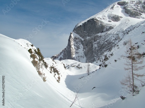 beautiful skitouring mountain terrain in winter landscape tennengebirge in austrian alps © luciezr
