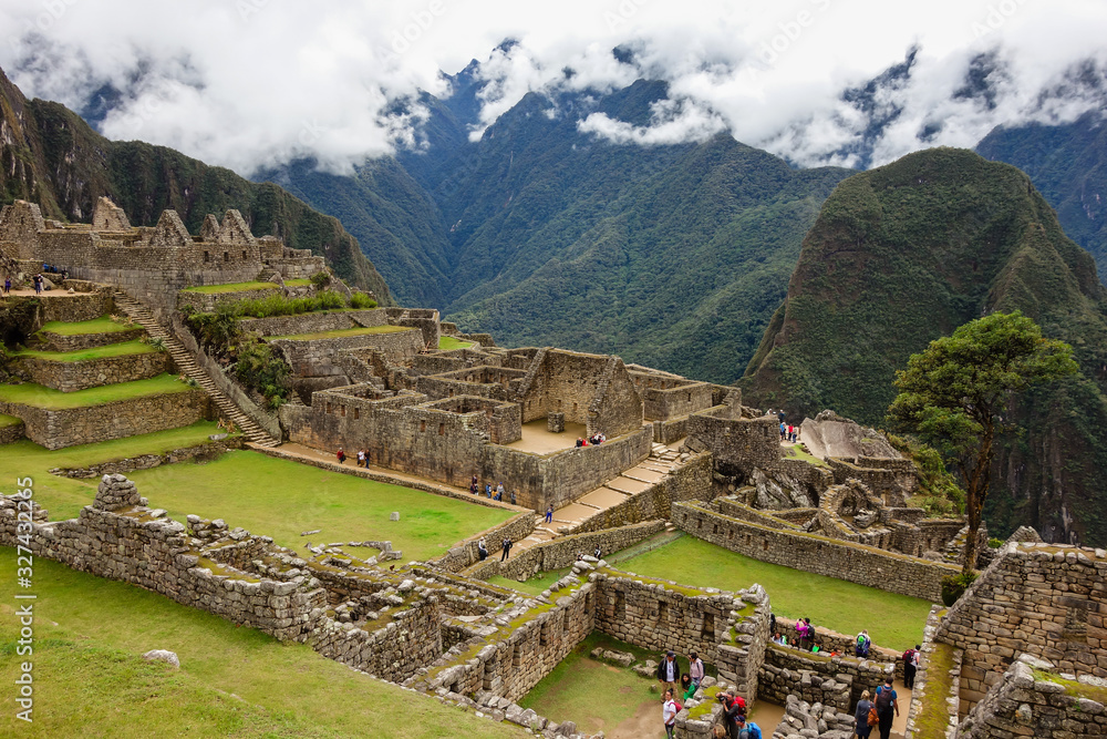 Cusco/Peru: tourists in Machu Picchu, Ancient inca town