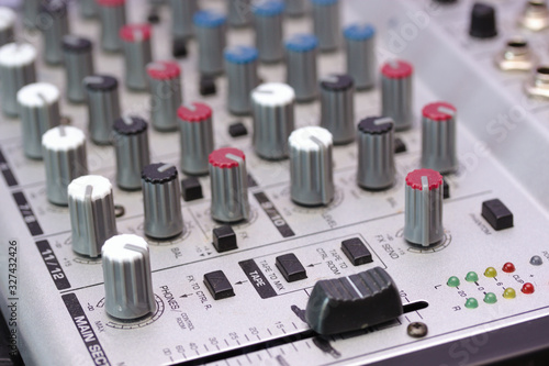 Audio sound mixer and amplifier equipment, sound acoustic musical mixing engineering concept background, selective focus.