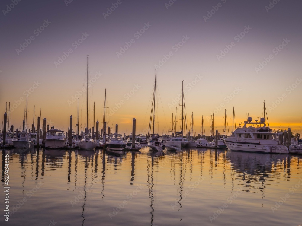 boat sunset sea ocean water marine shore harbor watercraft nautical sky sailing boat yacht sun night bay florida miami summer
