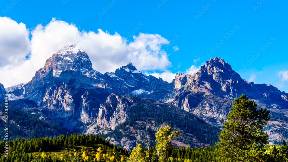 The tall mountain peaks of Grand Teton, Mount Owen and Teewinot Mountain in the Teton Range of Grand Teton National Park in Wyoming, United States