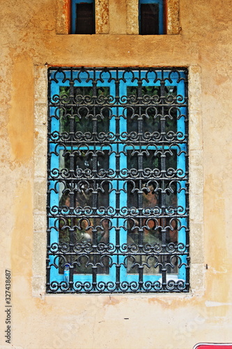 Window with grate