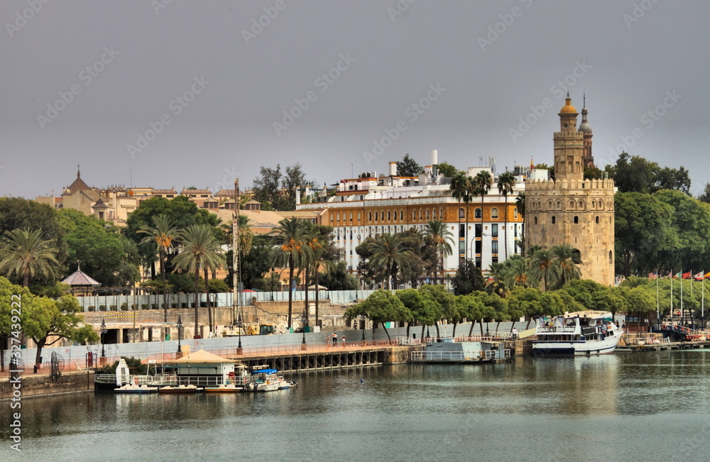 Cityscape of Sevilla with Golden tower, Spain