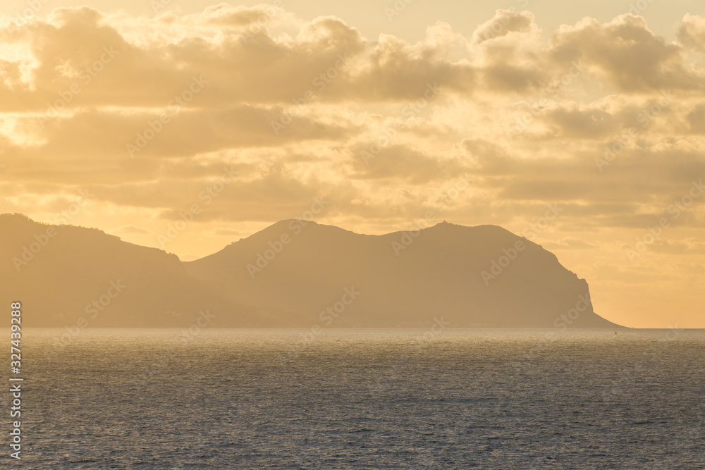 Distance view of Cape Gallo and Pellegrino Mountain over Tyrrhenian Sea from Zafferano headland on Sicily Island in Italy