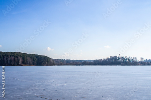 Winter landscape view of a frozen ice lake