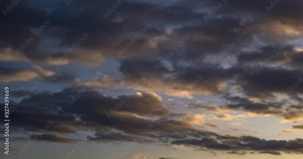 Timelapse of dark Blue sky background of tiny stratus cirrus striped clouds. Clearing evening and Good windy weather Timelapse of dark Blue sky background of tiny stratus cirrus striped clouds. Clearing evening and Good windy weather