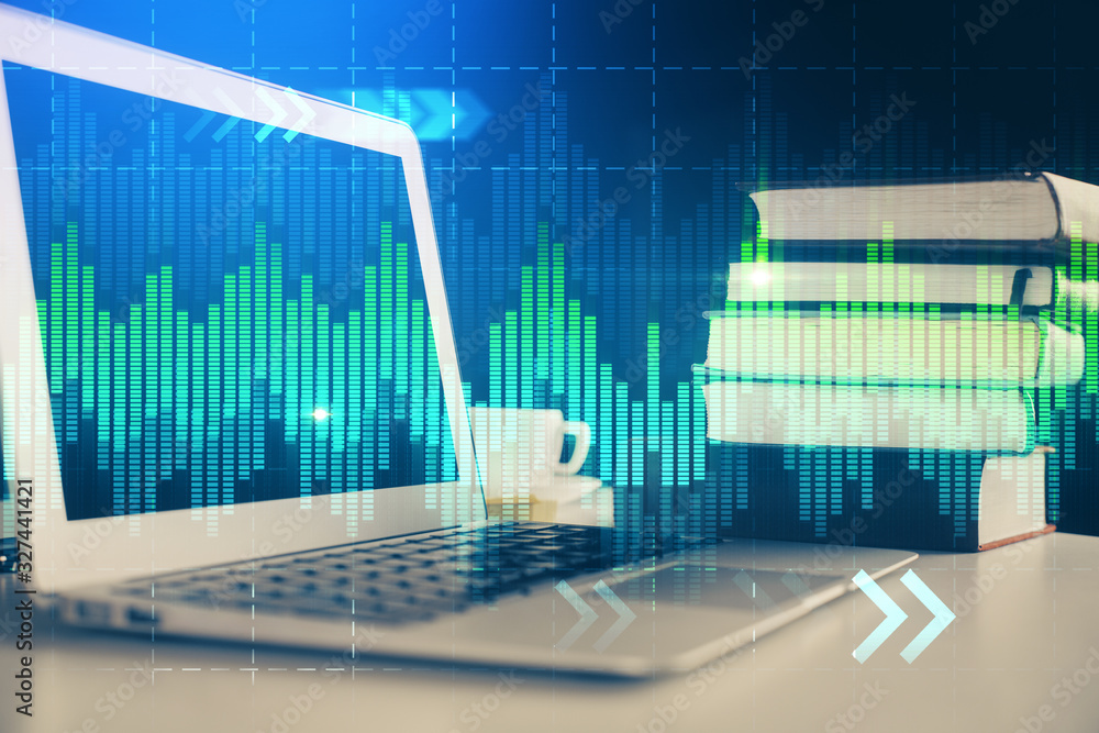 Forex market graph hologram and personal computer on background. Multi exposure. Concept of investment. Forex market graph hologram and personal computer on background. Multi exposure. Concept of investment.