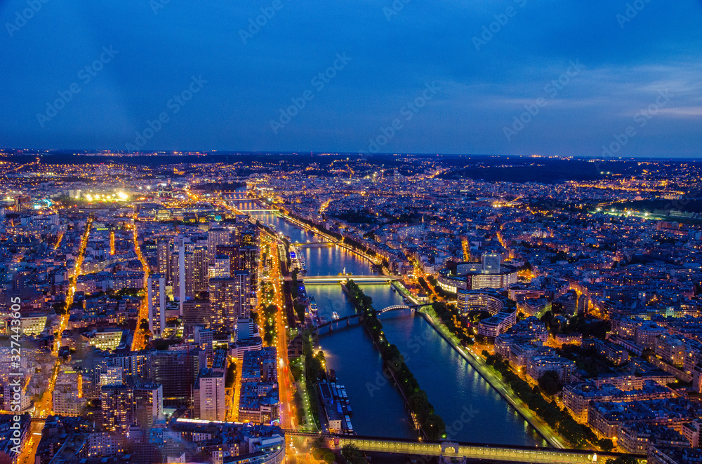 Beautiful night view from the top of Eiffel Tower in Paris France