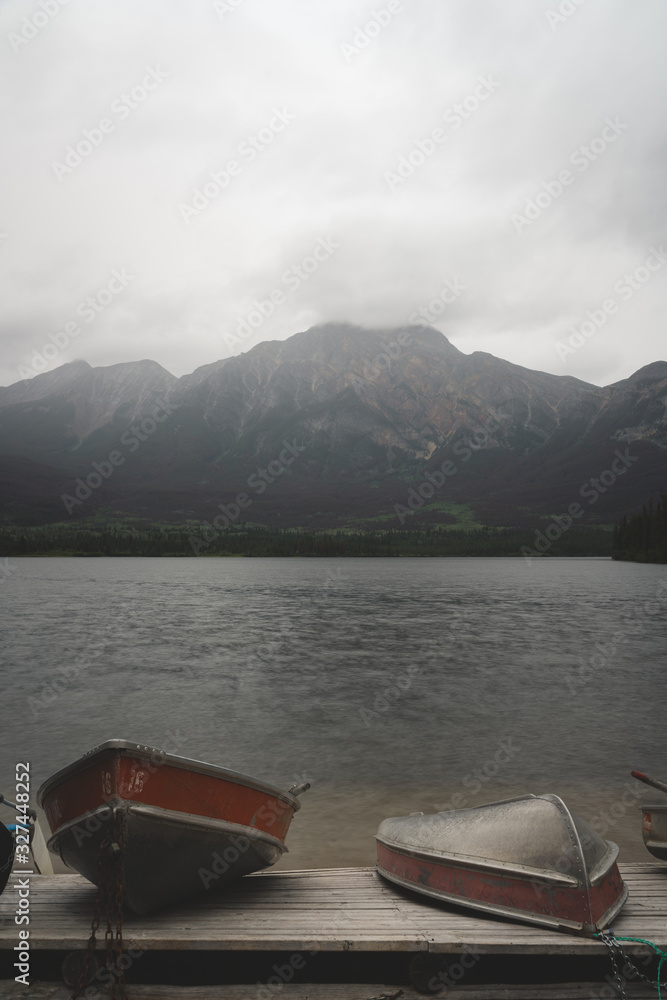 Outdoor Nature Landscape of Mountains and Lake in Banff National Park in Canadian Rockies during cloudy and stormy weather