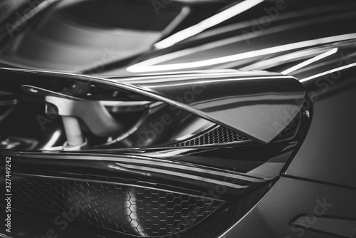Spoiler and stop light of a sports car in black and white © Visual Motiv