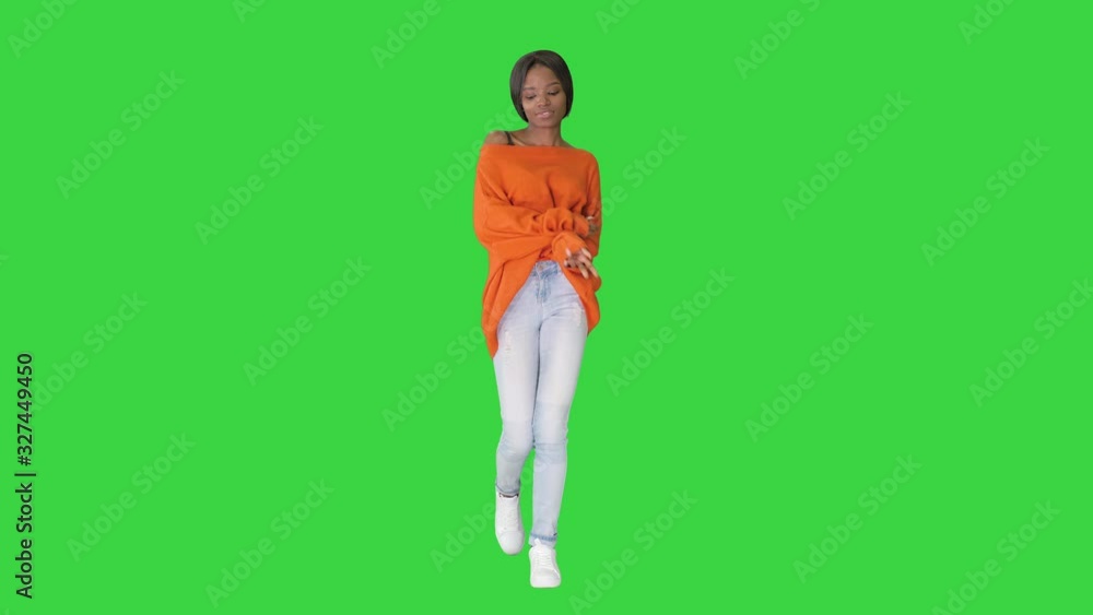 African American girl dancing walking on a Green Screen, Chroma Key