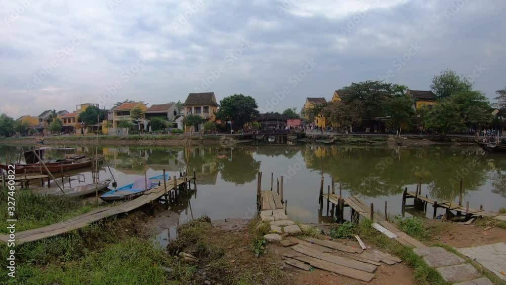 Riverfront view of Japanese Bridge at Hoi An ancient town, Vietnam Riverfront view of Japanese Bridge at Hoi An ancient town, Vietnam