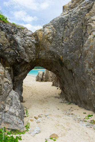 natural stone arch on Tokashiki island, Okinawa, Japan.