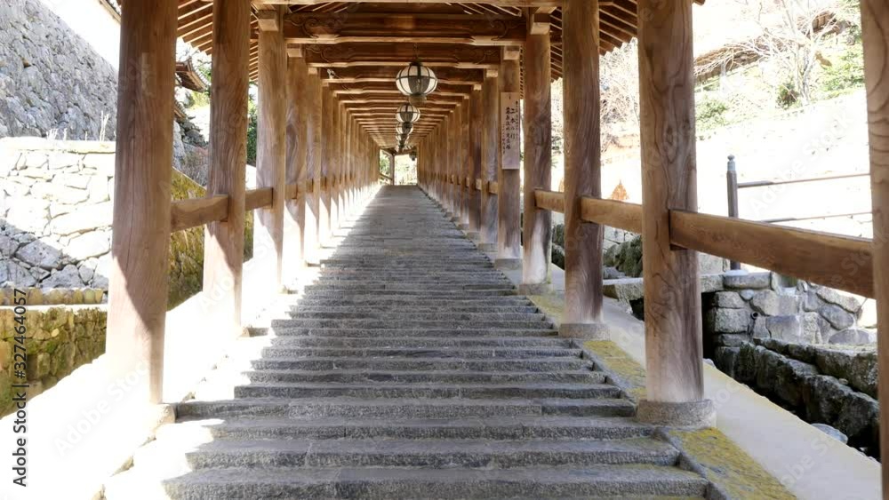 Nara,Japan-February 21, 2020: Ascending stone steps of Hasedera temple in Nara Nara,Japan-February 21, 2020: Ascending stone steps of Hasedera temple in Nara