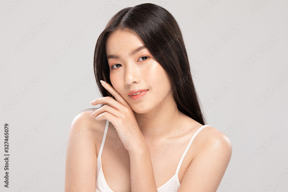 Beautiful Asian woman touching soft cheek smile with clean and fresh skin Happiness and cheerful with positive emotional,isolated on white background,Beauty and Cosmetics Concept Beautiful Asian woman touching soft cheek smile with clean and fresh skin Happiness and cheerful with positive emotional,isolated on white background,Beauty and Cosmetics Concept