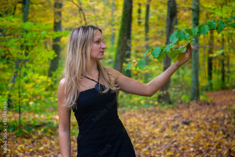 A girl in autumn forest A girl in autumn forest