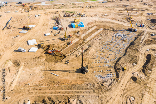 preparation of building foundation. construction of an apartment house at new residential area. aerial view 