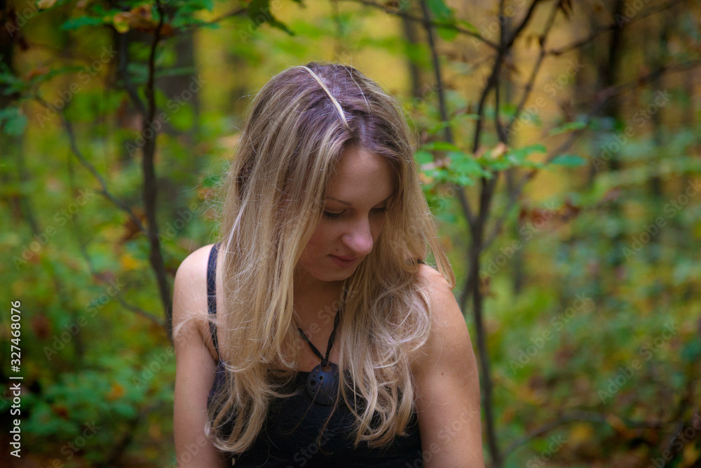 A girl in autumn forest A girl in autumn forest