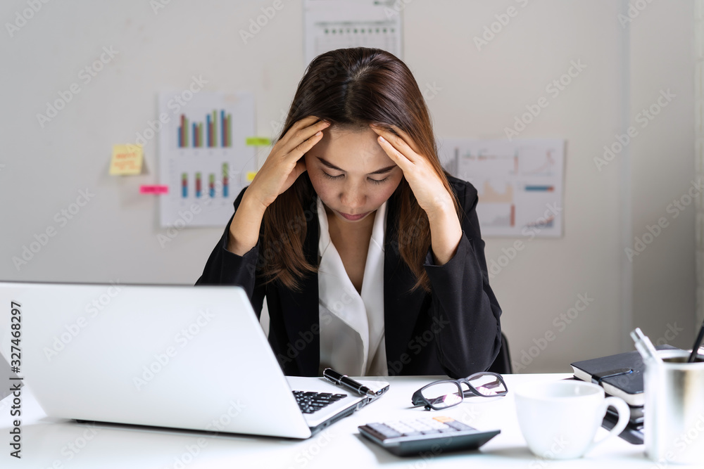 Stressed and depressed business woman working in office, Business failure concept