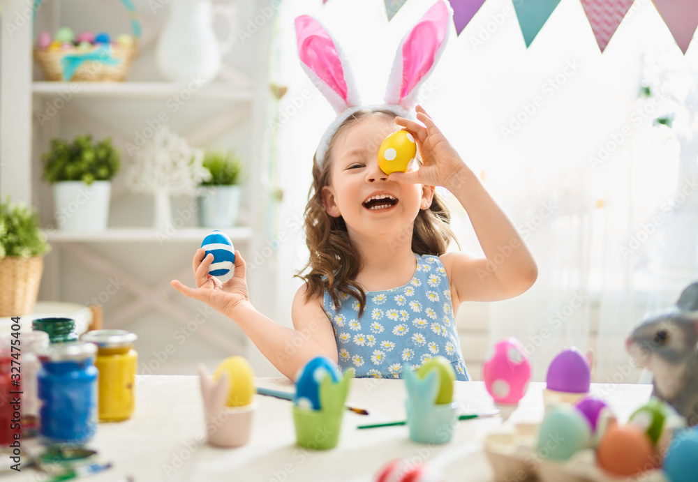 child painting eggs - obrazy, fototapety, plakaty 