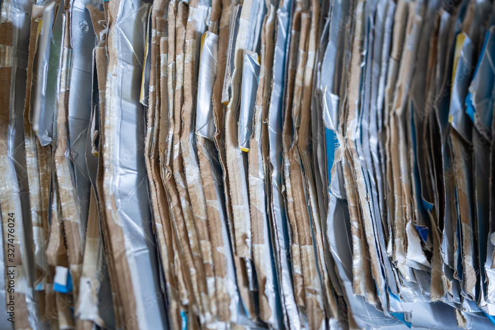 Fototapeta premium Milk carton packages collected for recycling.