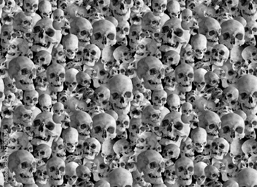 Seamless background of many human skulls. Illustration.