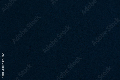 dark blue sand grainy plaster wall for background