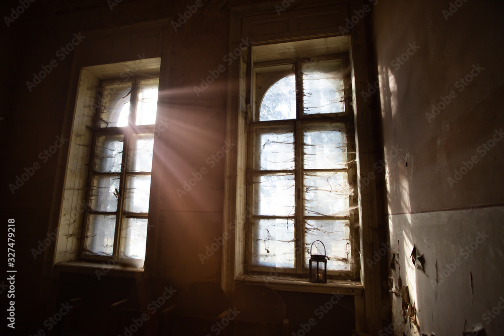 Spooky window with lantern and spider web. Spooky window with lantern and spider web.