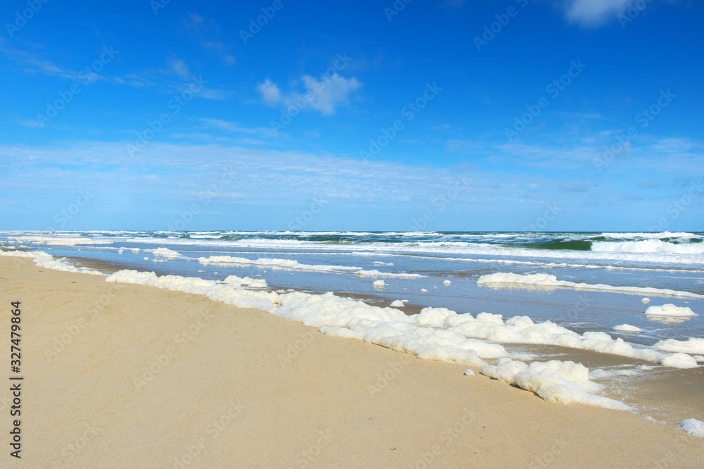 Empty beach with foam