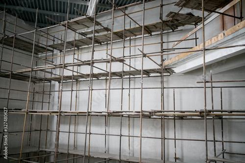 Wallpaper Mural Scaffolding and wall plastering in buildings are under construction Torontodigital.ca