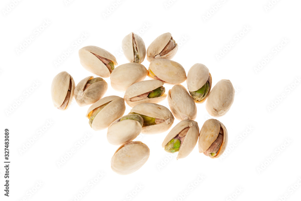 Salted pistachios nuts isolated on white background. Healthy snack. Salted pistachios nuts isolated on white background. Healthy snack.