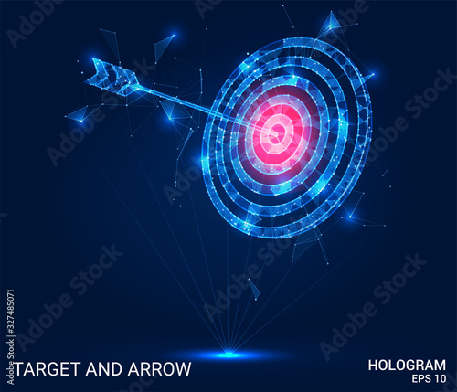 Hologram arrow and the target. An arrow and a target made of polygons, triangles of points, and lines. The arrow and target are low-poly compound structure. The technology concept. photo