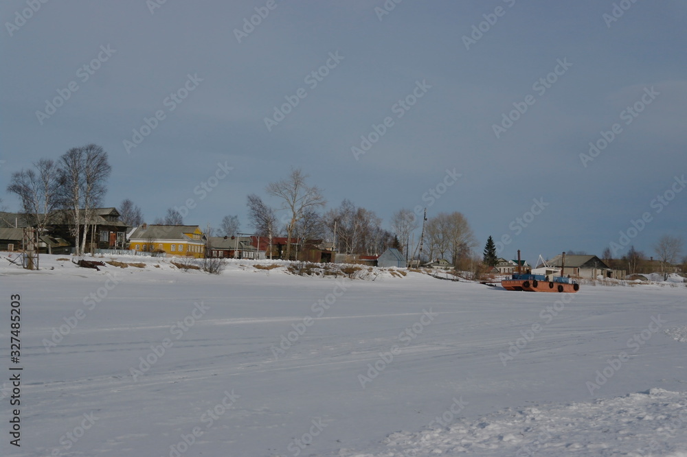 a village on an island in the Northern Dvina Delta in the winter. a village on an island in the Northern Dvina Delta in the winter.