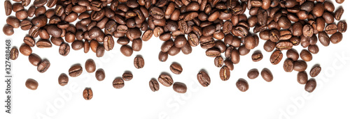 Roasted arabica coffee beans isolated on white background. Group of brown grains. © Andrii Zastrozhnov