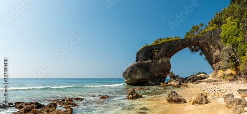 Panorama of the natural coral bridge on Lakshmanpur beach no 2 on Neil Island in Andaman and Nicobar Islands, India during high tide without people. 