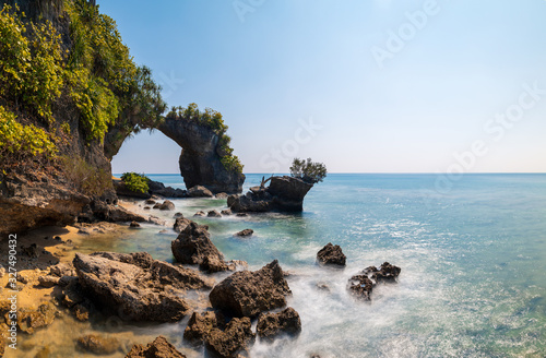 Long exposure during high tide on Lakshmanpur beach no 2 with the natural coral bridge on Neil Island in Andaman and Nicobar Islands, India. 