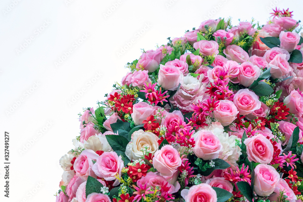Artificial roses on a white background. Artificial roses on a white background.