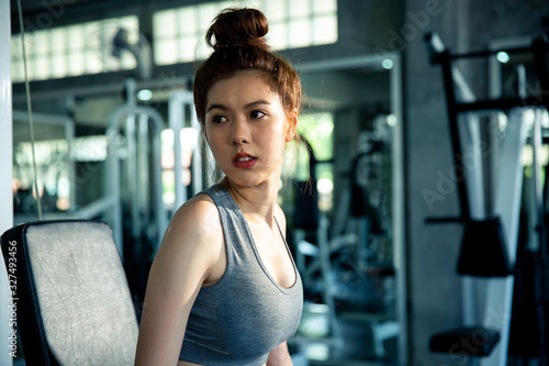 Health care concept, beauty woman portrait, Fitness a female is workout weight training in fitness club, Good Healthy Background with effect filter.