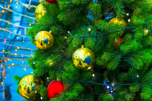 Decorated Christmas tree on a blurry background