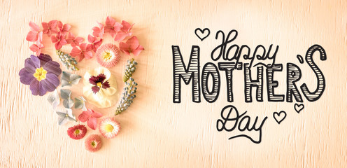 Notalgic Wooden Background With English Calligraphy Happy Mothers Day. Colorful Spring Flower Blossoms Heart