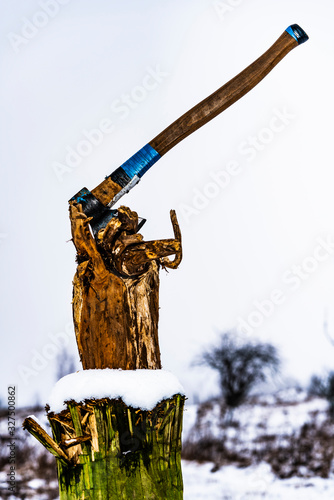 A stump on a stump, and an Apple tree in sight...