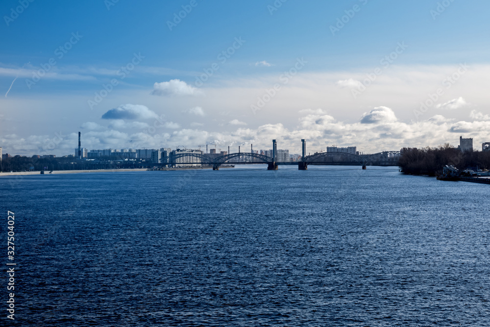 Panorama of the Neva river with a view of the Peter the Great bridge in Saint Petersburg.
