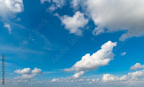 Fototapeta Naklejka Na Ścianę i Meble -  A blue sky with white clouds