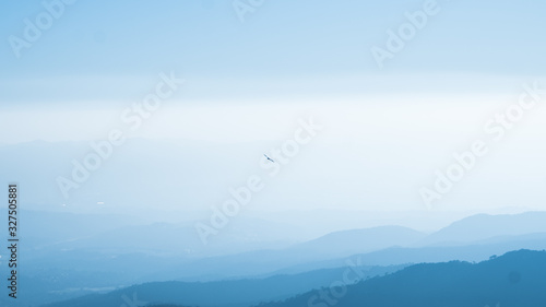 eagle fly around mountain and sky