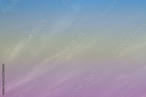 Blurry clounds in the sky with pastel colors.
