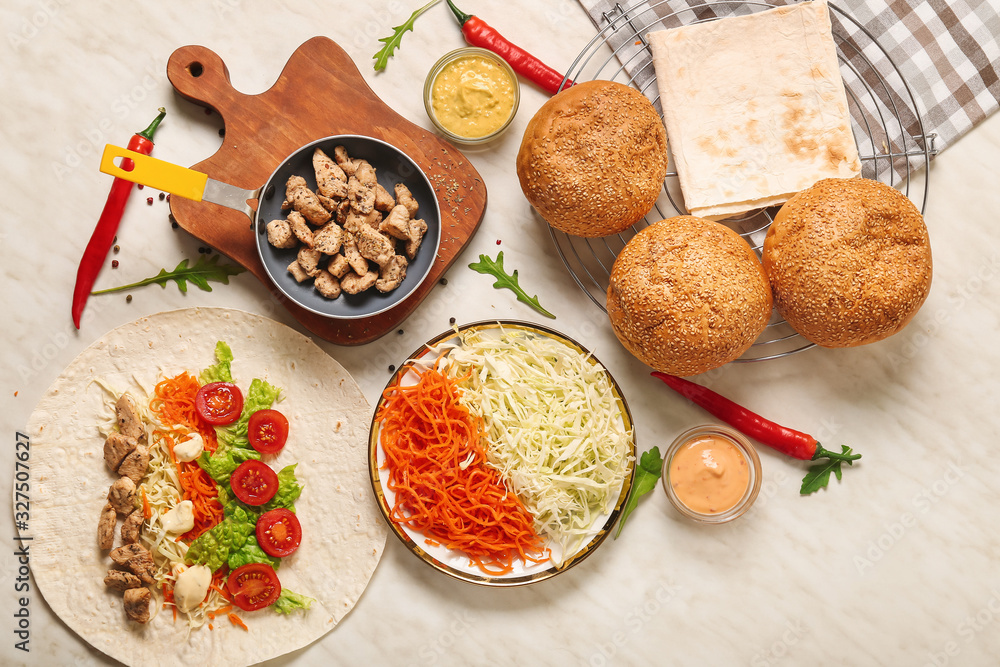 Ingredients for tasty doner kebab on table Ingredients for tasty doner kebab on table