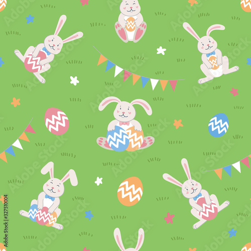 Easter seamless pattern. Easter cartoon bunnies and eggs on green background....