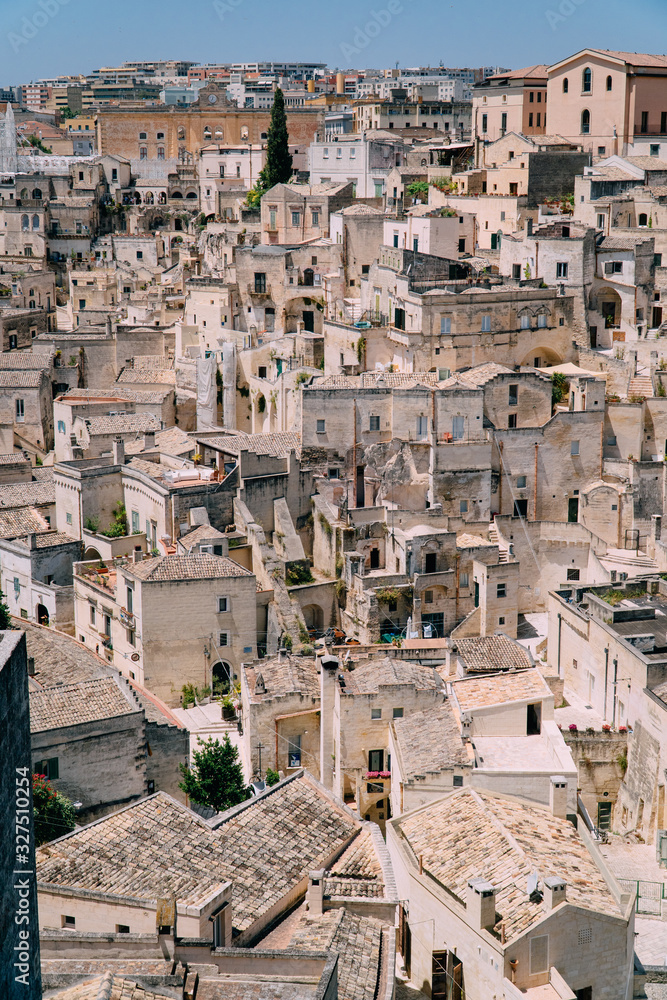 View of the narrow streets of the ancient city of Matera on a sunny day. Italy.