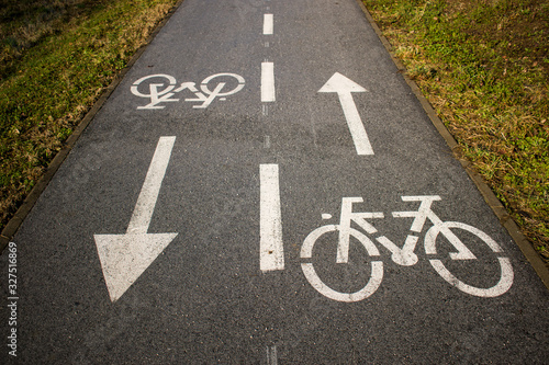 Bicycle track, two-way cycling lanes, painted bicycle symbol on asphalt