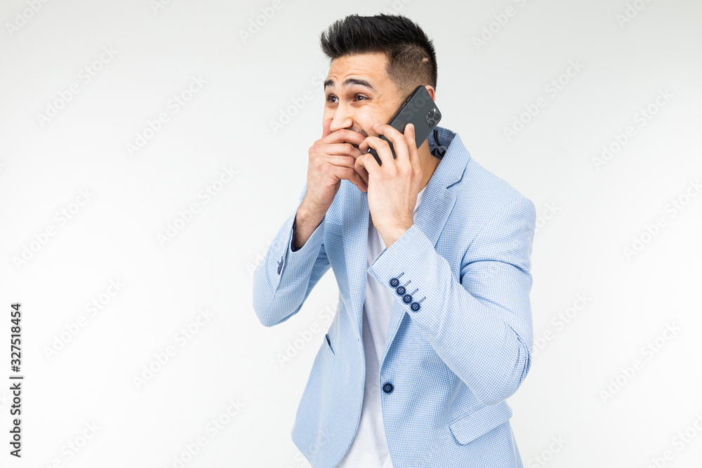portrait of a decent man laughing chatting on the phone portrait of a decent man laughing chatting on the phone